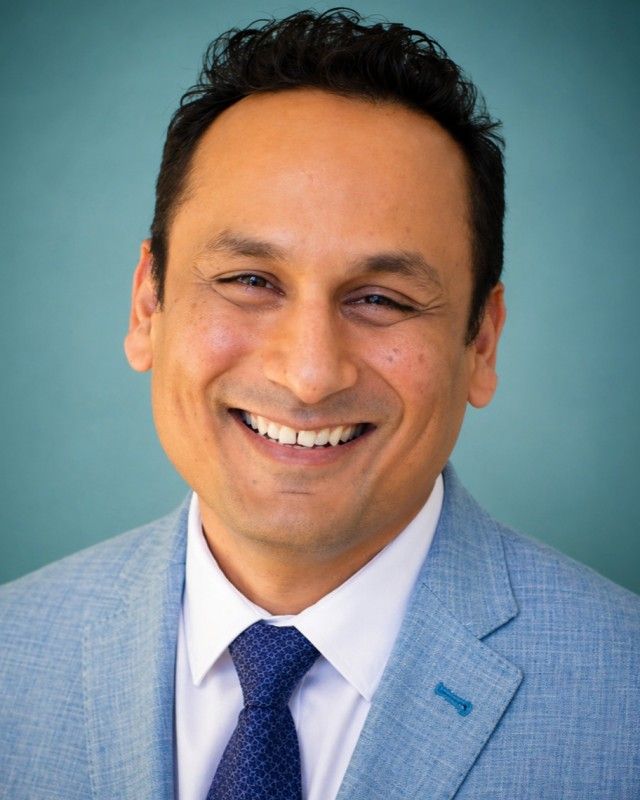 Official headshot of Prof. M. Ehsan Hoque, Associate Professor of Computer Science, University of Rochester