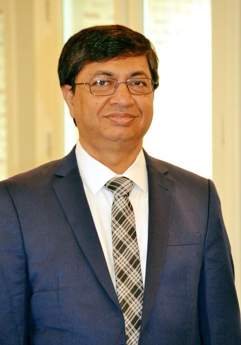 Official headshot of Professor M. Kabir Hassan, Hibernia Professor of Economics & Finance and Moffett Chair in World Resource Prices & Economic Development, University of New Orleans