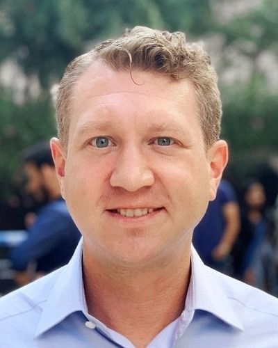 Official headshot of Peter Findley, speaker